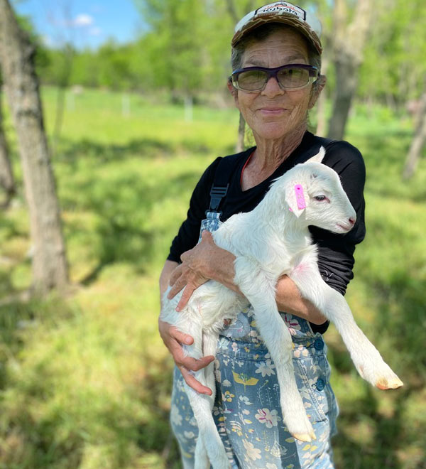 woman holding lamb